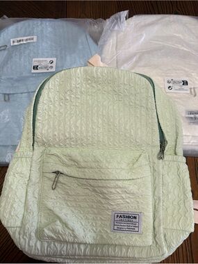Bundle three lightweight textured backpacks new. By fashion instinct.
